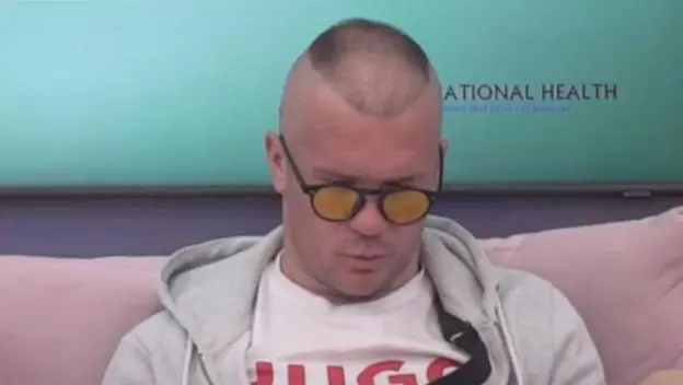 Munjez plakao nad slikom sina/Photo: Printscreen